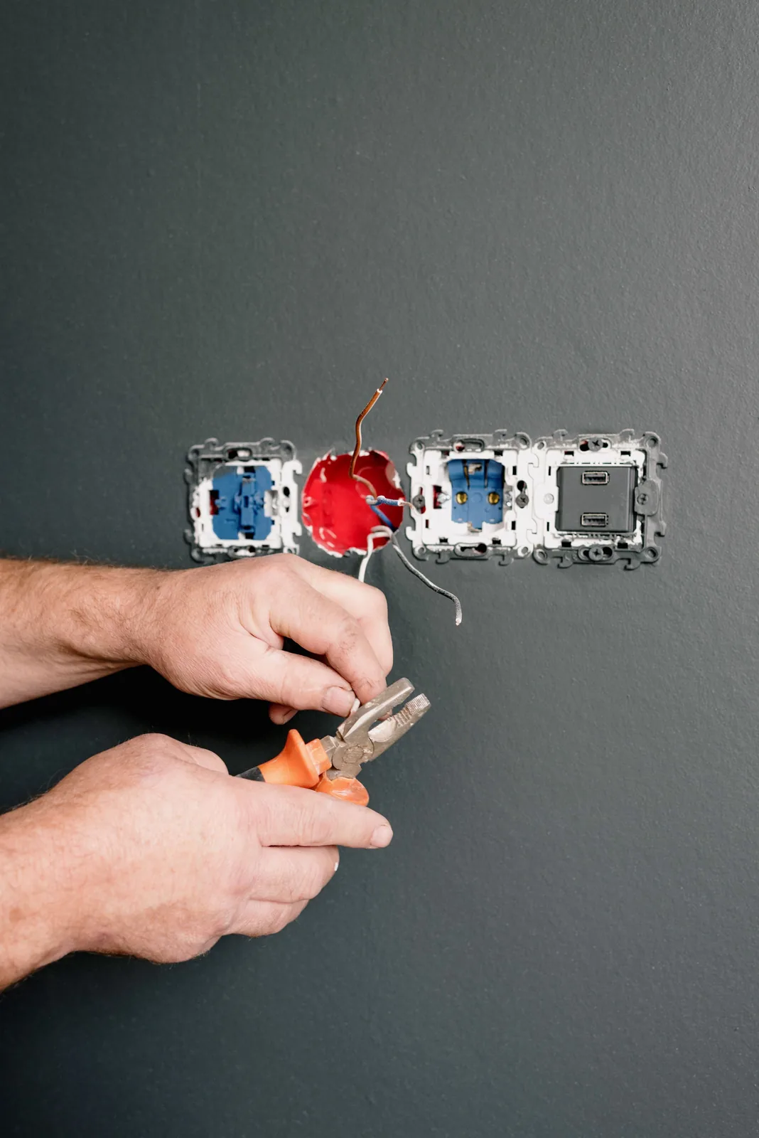 Wiring an outlet box into a finished wall, for code violation in Surrey